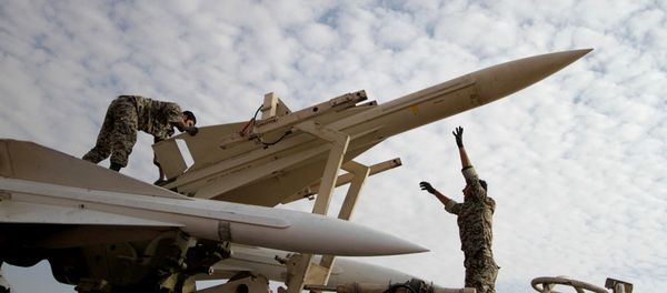 Iranian soldiers prepare to launch a Hawk surface-to-air missile during military maneuvers at an undisclosed location Iranian soldiers prepare to launch a Hawk surface-to-air missile during military maneuvers at an undisclosed location - Sputnik International