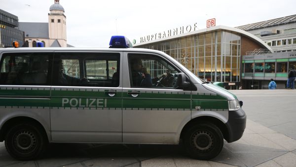 A police vehicle patrols at the main square and in front of the central railway station in Cologne, Germany, January 5, 2016 A police vehicle patrols at the main square and in front of the central railway station in Cologne, Germany, January 5, 2016 - Sputnik International