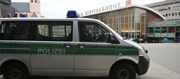 A police vehicle patrols at the main square and in front of the central railway station in Cologne, Germany, January 5, 2016 A police vehicle patrols at the main square and in front of the central railway station in Cologne, Germany, January 5, 2016 - Sputnik International