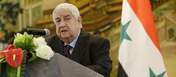 Syria's Foreign Minister Walid al-Moualem speaks during a joint news conference with China's Foreign Minister Wang Yi (not seen) after a meeting at the Ministry of Foreign Affairs in Beijing, China, December 24, 2015 Syria's Foreign Minister Walid al-Moualem speaks during a joint news conference with China's Foreign Minister Wang Yi (not seen) after a meeting at the Ministry of Foreign Affairs in Beijing, China, December 24, 2015 - Sputnik International