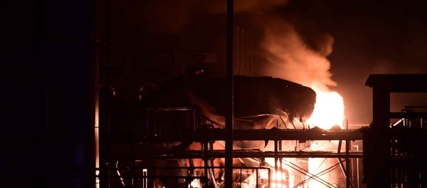 In this photo released by China's Xinhua News Agency, a chemical plant of Shandong Runxing Chemical Technology Co. is on fire following an explosion in Zibo, east China's Shandong Province, Sunday, Aug. 23, 2015 In this photo released by China's Xinhua News Agency, a chemical plant of Shandong Runxing Chemical Technology Co. is on fire following an explosion in Zibo, east China's Shandong Province, Sunday, Aug. 23, 2015 - Sputnik International