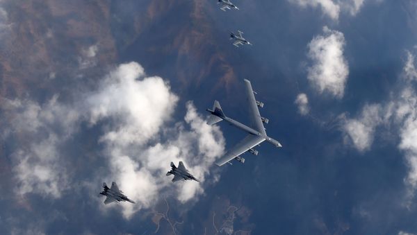This picture taken by the Republic of Korea Air Force on January 10, 2016 and released via Yonhap news agency shows a US B-52 Stratofortress (C) flying with South Korean F-15K fighter jets (bottom) and US F-16 fighter jets (top) over South Korea This picture taken by the Republic of Korea Air Force on January 10, 2016 and released via Yonhap news agency shows a US B-52 Stratofortress (C) flying with South Korean F-15K fighter jets (bottom) and US F-16 fighter jets (top) over South Korea - Sputnik International