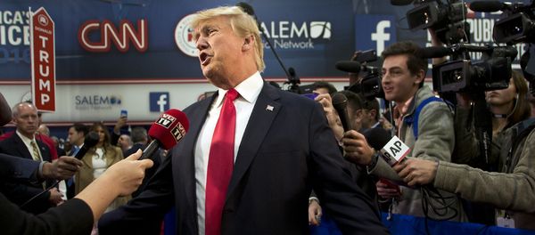 Republican presidential candidate businessman Donald Trump speaks with the media in the Spin Room following the Republican Presidential Debate, hosted by CNN, at The Venetian Las Vegas on December 15, 2015 in Las Vegas, Nevada - Sputnik International