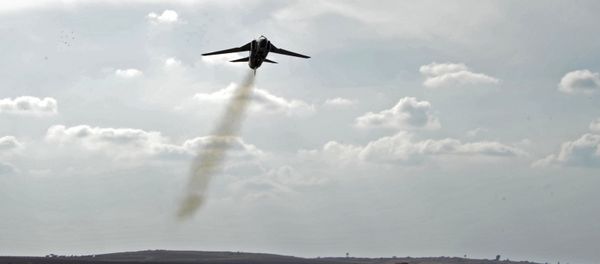 A MiG-23 aircraft of the Syrian Air Force lands at the Hama airbase near the city of Hama, Syria's Hama Province - Sputnik International