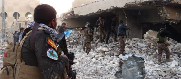 Iraqi forces secure an area in Ramadi, the capital of Iraq's Anbar province, on January 10, 2016, after retaking the city from Islamic State (IS) group jihadists Iraqi forces secure an area in Ramadi, the capital of Iraq's Anbar province, on January 10, 2016, after retaking the city from Islamic State (IS) group jihadists - Sputnik International