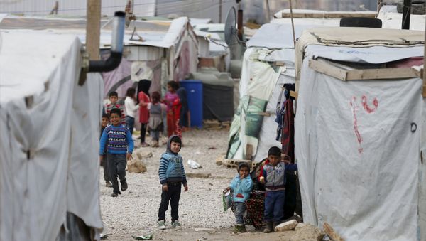 Syrian children are seen inside an informal settlement for Syrian refugees in Bar Elias, Bekaa valley, Lebanon, January 6, 2016 - Sputnik International