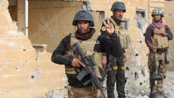 Members of Iraq's elite counter-terrorism service stand on December 27, 2015 in the Hoz neighbourhood in central Ramadi, the capital of Iraq's Anbar province, about 110 kilometers west of Baghdad, during military operations conducted by Iraqi pro-government forces against the Islamic State (IS) jihadist group Members of Iraq's elite counter-terrorism service stand on December 27, 2015 in the Hoz neighbourhood in central Ramadi, the capital of Iraq's Anbar province, about 110 kilometers west of Baghdad, during military operations conducted by Iraqi pro-government forces against the Islamic State (IS) jihadist group - Sputnik International