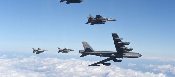 This picture taken by the Republic of Korea Air Force on January 10, 2016 and released via Yonhap news agency shows a US B-52 Stratofortress (bottom R) flying with South Korean F-15K fighter jets (top) and US F-16 fighter jets (bottom L) over South Korea This picture taken by the Republic of Korea Air Force on January 10, 2016 and released via Yonhap news agency shows a US B-52 Stratofortress (bottom R) flying with South Korean F-15K fighter jets (top) and US F-16 fighter jets (bottom L) over South Korea - Sputnik International
