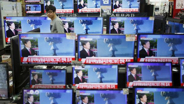 A sales assistant watches TV sets broadcasting a news report on North Korea's nuclear test, in Seoul, January 6, 2016 A sales assistant watches TV sets broadcasting a news report on North Korea's nuclear test, in Seoul, January 6, 2016 - Sputnik International