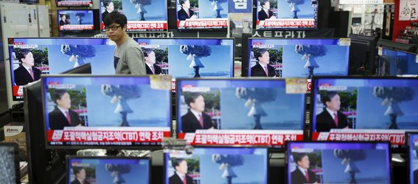 A sales assistant watches TV sets broadcasting a news report on North Korea's nuclear test, in Seoul, January 6, 2016 A sales assistant watches TV sets broadcasting a news report on North Korea's nuclear test, in Seoul, January 6, 2016 - Sputnik International