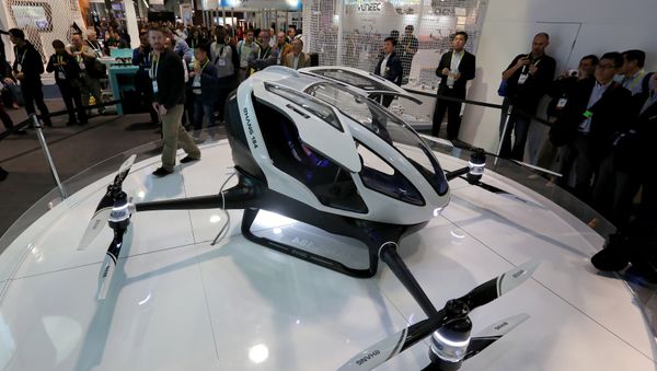 The newly-launched EHang 184 AAV (Autonomous Aerial Vehicle) that can autonomously fly a human passenger, programmed with an app, is displayed at the CES 2016 Consumer Electronics Show in Las Vegas, Nevada on January 7, 2016 The newly-launched EHang 184 AAV (Autonomous Aerial Vehicle) that can autonomously fly a human passenger, programmed with an app, is displayed at the CES 2016 Consumer Electronics Show in Las Vegas, Nevada on January 7, 2016 - Sputnik International