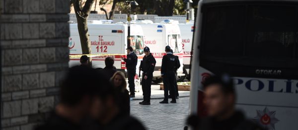 Turkish police stand next to ambulances as they block access to the Blue Mosque area on January 12, 2016 after a blast in Istanbul's tourist hub of Sultanahmet left 10 people dead - Sputnik International