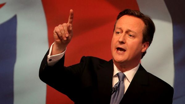 Britain's Prime Minister David Cameron gestures as he unveils the Conservative party manifesto, in Swindon, England, Tuesday April 14, 2015. - Sputnik International