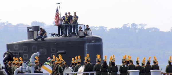 A local marching band welcomes the arrival of sailors aboard the USS Topeka (SSN-754), a Los Angeles-class submarine, as it prepares to be docked at the Alava pier off Subic port in Zambales province for a three-day port call at northwestern Philippines, Tuesday, Jan. 12, 2016 A local marching band welcomes the arrival of sailors aboard the USS Topeka (SSN-754), a Los Angeles-class submarine, as it prepares to be docked at the Alava pier off Subic port in Zambales province for a three-day port call at northwestern Philippines, Tuesday, Jan. 12, 2016 - Sputnik International