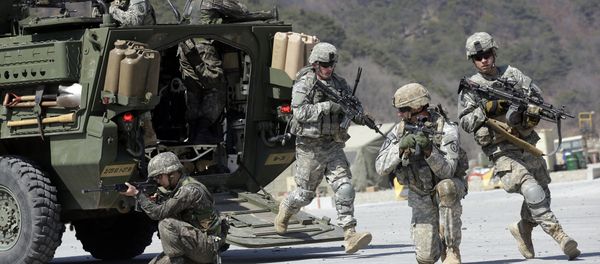 U.S. Army soldiers from the 25th Infantry Division’s 2nd Stryker Brigade Combat Team and South Korean soldiers take their position during a demonstration of the combined arms live-fire exercise. U.S. Army soldiers from the 25th Infantry Division’s 2nd Stryker Brigade Combat Team and South Korean soldiers take their position during a demonstration of the combined arms live-fire exercise. - Sputnik International