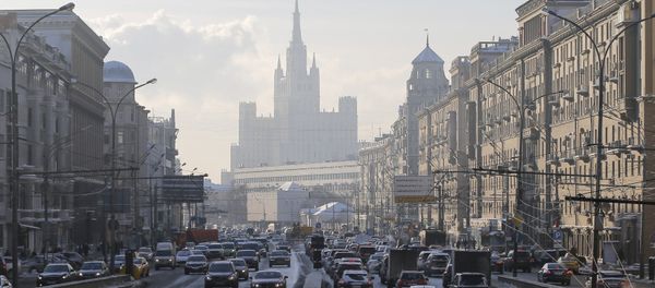 Cars drive along the Garden Ring road, with a residential building at Kudrinskaya Square seen on the background, in Moscow, Russia Cars drive along the Garden Ring road, with a residential building at Kudrinskaya Square seen on the background, in Moscow, Russia - Sputnik International