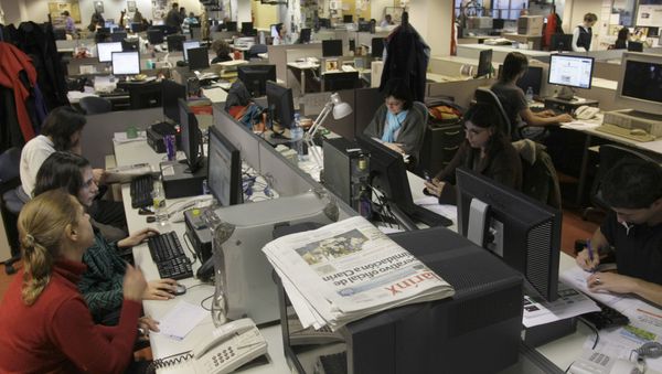People work at the newsroom of the Argentina's newspaper Clarin in Buenos Aires People work at the newsroom of the Argentina's newspaper Clarin in Buenos Aires - Sputnik International