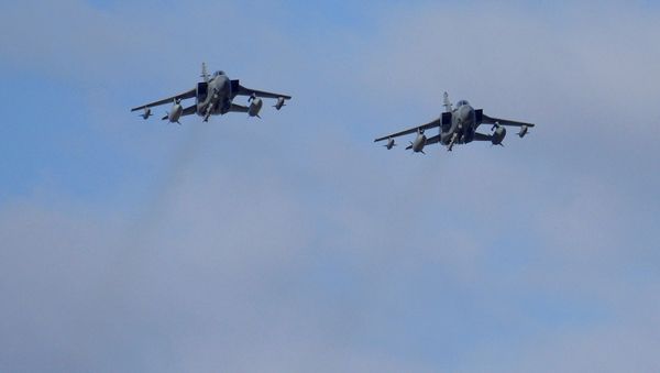 Two British Tornados warplanes fly over the RAF Akrotiri, a British air base near costal city of Limassol, Cyprus as they arrive from an airstrike against Islamic State group targets in Syria. (File) Two British Tornados warplanes fly over the RAF Akrotiri, a British air base near costal city of Limassol, Cyprus as they arrive from an airstrike against Islamic State group targets in Syria. (File) - Sputnik International