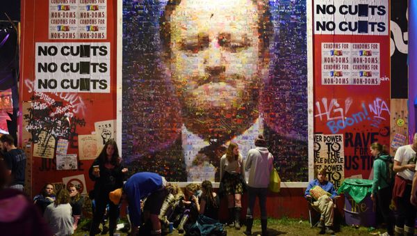 A large mural depicting British Prime Minster David Cameron is displayed in the Hell section of the Shangri La area of the Glastonbury Festival - Sputnik International