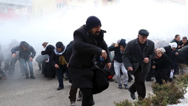 Riot police use water cannons to disperse pro-Kurdish demonstrators during a protest against security operations in the Kurdish-dominated southeast, in Van, Turkey Riot police use water cannons to disperse pro-Kurdish demonstrators during a protest against security operations in the Kurdish-dominated southeast, in Van, Turkey - Sputnik International
