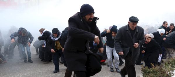 Riot police use water cannons to disperse pro-Kurdish demonstrators during a protest against security operations in the Kurdish-dominated southeast, in Van, Turkey Riot police use water cannons to disperse pro-Kurdish demonstrators during a protest against security operations in the Kurdish-dominated southeast, in Van, Turkey - Sputnik International