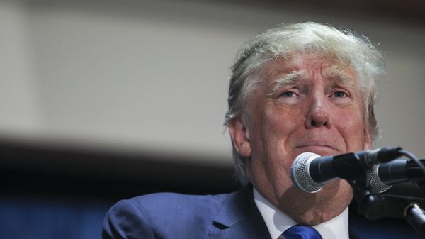 Republican presidential candidate Donald Trump reacts to a question posed by an audience member at Politics and Eggs in Manchester, N.H., Wednesday, Nov. 11, 2015. - Sputnik International