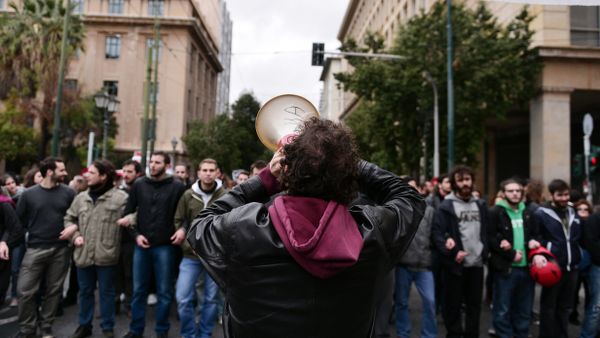 A demonstrator shouts slogans in a megaphone during a rally in central Athens on January 16, 2016 called by Greek main workers' unions to condemn a planned overhaul of Greece's pension system demanded by its international creditors. - Sputnik International