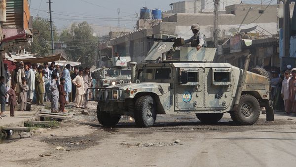 Afghan security forces inspect the site of a suicide attack in Jalalabad, east of Kabul, Afghanistan (File) - Sputnik International