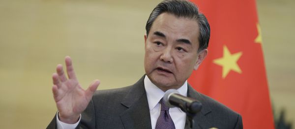 China's Foreign Minister Wang Yi speaks at a joint news conference with British Foreign Secretary Philip Hammond (not seen) after a meeting at the Ministry of Foreign Affairs, in Beijing, China, January 5, 2016 China's Foreign Minister Wang Yi speaks at a joint news conference with British Foreign Secretary Philip Hammond (not seen) after a meeting at the Ministry of Foreign Affairs, in Beijing, China, January 5, 2016 - Sputnik International