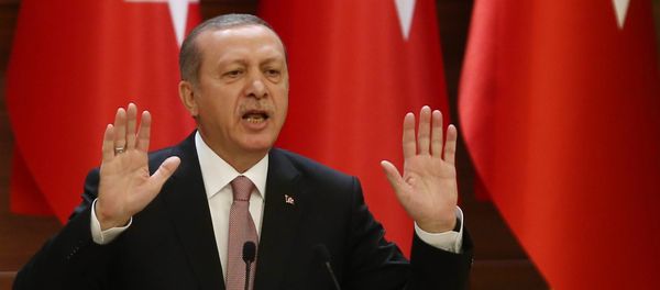 Turkish President Recep Tayyip Erdogan delivers a speech during a mukhtars meeting at the presidential palace on November 26, 2015 in Ankara Turkish President Recep Tayyip Erdogan delivers a speech during a mukhtars meeting at the presidential palace on November 26, 2015 in Ankara - Sputnik International