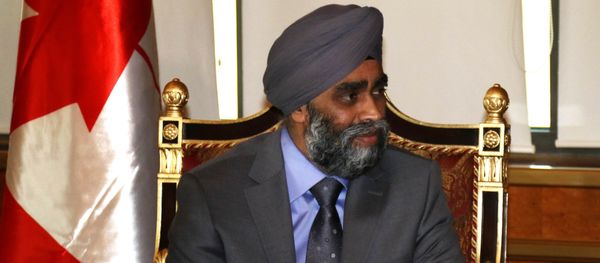 Canadian Minister of National Defence Harjit Sajjan looks on during his meeting with Iraqi Kurdish leader Massud Barzani in Arbil, the capital of the Kurdish autonomous region in northern Iraq, on December 21, 2015 Canadian Minister of National Defence Harjit Sajjan looks on during his meeting with Iraqi Kurdish leader Massud Barzani in Arbil, the capital of the Kurdish autonomous region in northern Iraq, on December 21, 2015 - Sputnik International