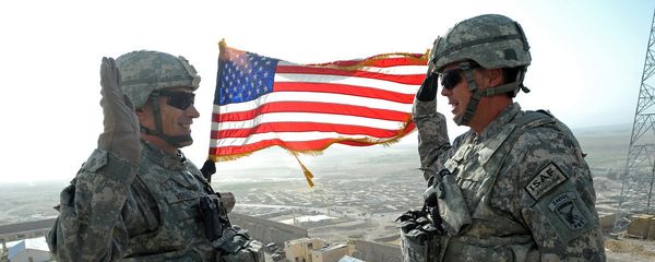U.S. Air Force Lt. Col. Andy Veres, left, Provincial Reconstruction Team Zabul commander, re-enlists Master Sgt. James Sandifer, Forward Operating Base Smart mayor, on top of Alexander's castle in Qalat City, Afghanistan, July 7 - Sputnik International