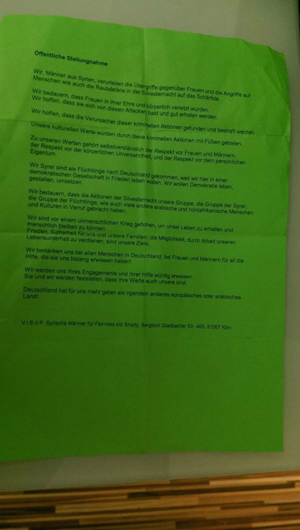 A flyer handed out by yound Syrians at the entrance to the university cafeteria in Cologne. - Sputnik International