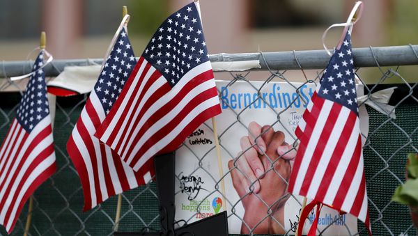 A memorial still remains outside as workers return to work for the first time at the Inland Regional Center (IRC) in San Bernardino, California, January 4, 2016. A memorial still remains outside as workers return to work for the first time at the Inland Regional Center (IRC) in San Bernardino, California, January 4, 2016. - Sputnik International