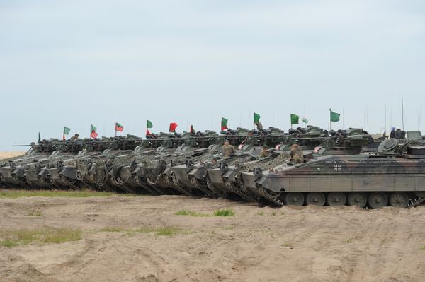 German army tanks line up during the course of the NATO Noble Jump exercise on a training range near Swietoszow Zagan, Poland, June 2015. The German military has seen an increase in deployments for exercises in Eastern Europe and on Russia's borders since the start of the Ukrainian crisis in February 2014. - Sputnik International
