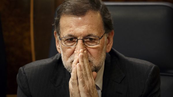 Spain's Acting Prime Minister Mariano Rajoy sits on his chair at the Spanish Parliament in Madrid, Wednesday, Jan. 13, 2016 - Sputnik International