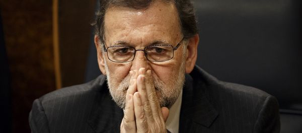 Spain's Acting Prime Minister Mariano Rajoy sits on his chair at the Spanish Parliament in Madrid, Wednesday, Jan. 13, 2016 Spain's Acting Prime Minister Mariano Rajoy sits on his chair at the Spanish Parliament in Madrid, Wednesday, Jan. 13, 2016 - Sputnik International