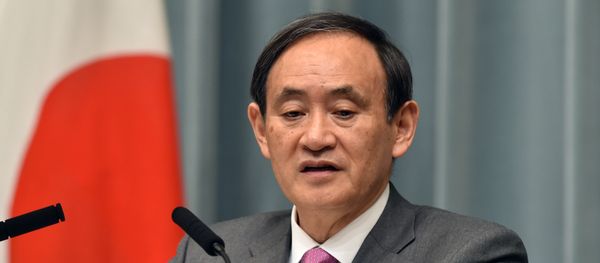 Japan's Chief Cabinet Secretary Yoshihide Suga speaks at a press conference at the prime minister's official residence in Tokyo on March 19, 2015 Japan's Chief Cabinet Secretary Yoshihide Suga speaks at a press conference at the prime minister's official residence in Tokyo on March 19, 2015 - Sputnik International
