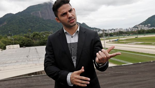 David Miranda, the domestic partner of Brazil-based American journalist Glenn Greenwald, talks during an interview in Rio de Janeiro, Brazil, Tuesday, Dec. 17, 2013. - Sputnik International
