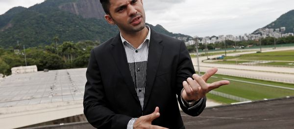 David Miranda, the domestic partner of Brazil-based American journalist Glenn Greenwald, talks during an interview in Rio de Janeiro, Brazil, Tuesday, Dec. 17, 2013. - Sputnik International