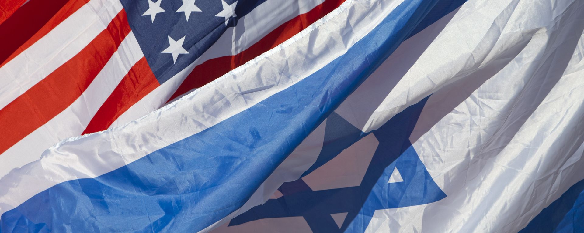 US and Israeli flags fly as U.S. Secretary of State John Kerry arrives in Tel Aviv, Israel, 24 November 2015 US and Israeli flags fly as U.S. Secretary of State John Kerry arrives in Tel Aviv, Israel, 24 November 2015 - Sputnik International, 1920, 16.05.2021