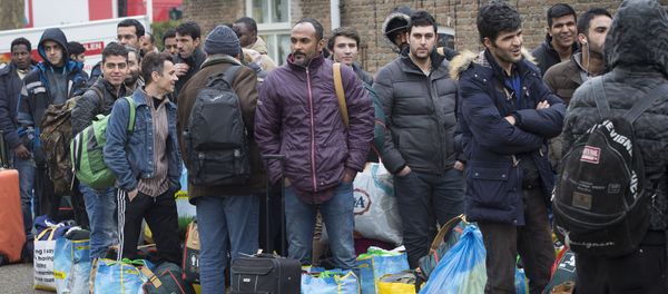 Refugees queue as they arrive at the vacation park Droomgaard in Kaatsheuvel, on January 6, 2016 Refugees queue as they arrive at the vacation park Droomgaard in Kaatsheuvel, on January 6, 2016 - Sputnik International