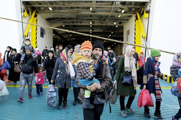Refugees and migrants arrive aboard the passenger ferry Eleftherios Venizelos from the island of Lesbos at the port of Piraeus, near Athens, Greece, December 26, 2015. Refugees and migrants arrive aboard the passenger ferry Eleftherios Venizelos from the island of Lesbos at the port of Piraeus, near Athens, Greece, December 26, 2015. - Sputnik International
