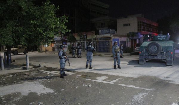 Afghan security forces inspect the site of a Park Palace Hotel attack by Taliban militants, in Kabul, Afghanistan, Wednesday, May 13, 2015 - Sputnik International