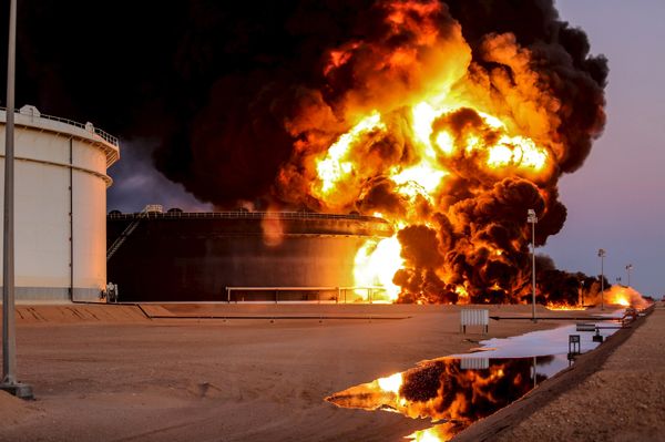 Fire rises from an oil tank in the port of Es Sider, in Ras Lanuf, Libya, in this file picture taken January 4, 2016. Fire rises from an oil tank in the port of Es Sider, in Ras Lanuf, Libya, in this file picture taken January 4, 2016. - Sputnik International