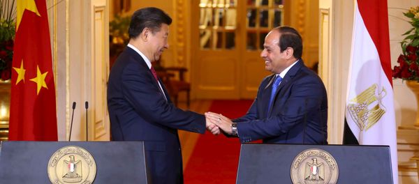 Egyptian President Abdel Fattah al-Sisi (R) and Chinese President Xi Jinping (L) shake hands after their joint press conference following their meeting in Cairo, Egypt, January 21, 2016, in this handout courtesy of the Egyptian Presidency. Picture taken January 21, 2016 Egyptian President Abdel Fattah al-Sisi (R) and Chinese President Xi Jinping (L) shake hands after their joint press conference following their meeting in Cairo, Egypt, January 21, 2016, in this handout courtesy of the Egyptian Presidency. Picture taken January 21, 2016 - Sputnik International