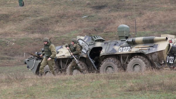 Russian Interior Ministry troops during a tactical exercise held in Simferopol District Russian Interior Ministry troops during a tactical exercise held in Simferopol District - Sputnik International
