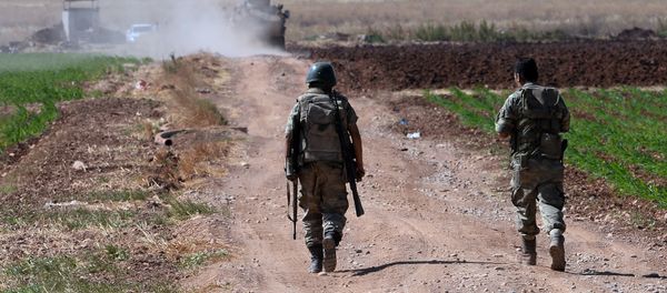 Turkish soldiers patrol near the border with Syria, ouside the village of Elbeyli, east of the town of Kilis, southeastern Turkey - Sputnik International