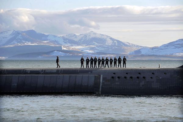 British Navy personnel stand atop the Trident Nuclear Submarine, HMS Victorious, on patrol off the west coast of Scotland British Navy personnel stand atop the Trident Nuclear Submarine, HMS Victorious, on patrol off the west coast of Scotland - Sputnik International