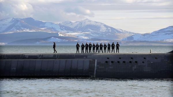 British Navy personnel stand atop the Trident Nuclear Submarine, HMS Victorious, on patrol off the west coast of Scotland - Sputnik International